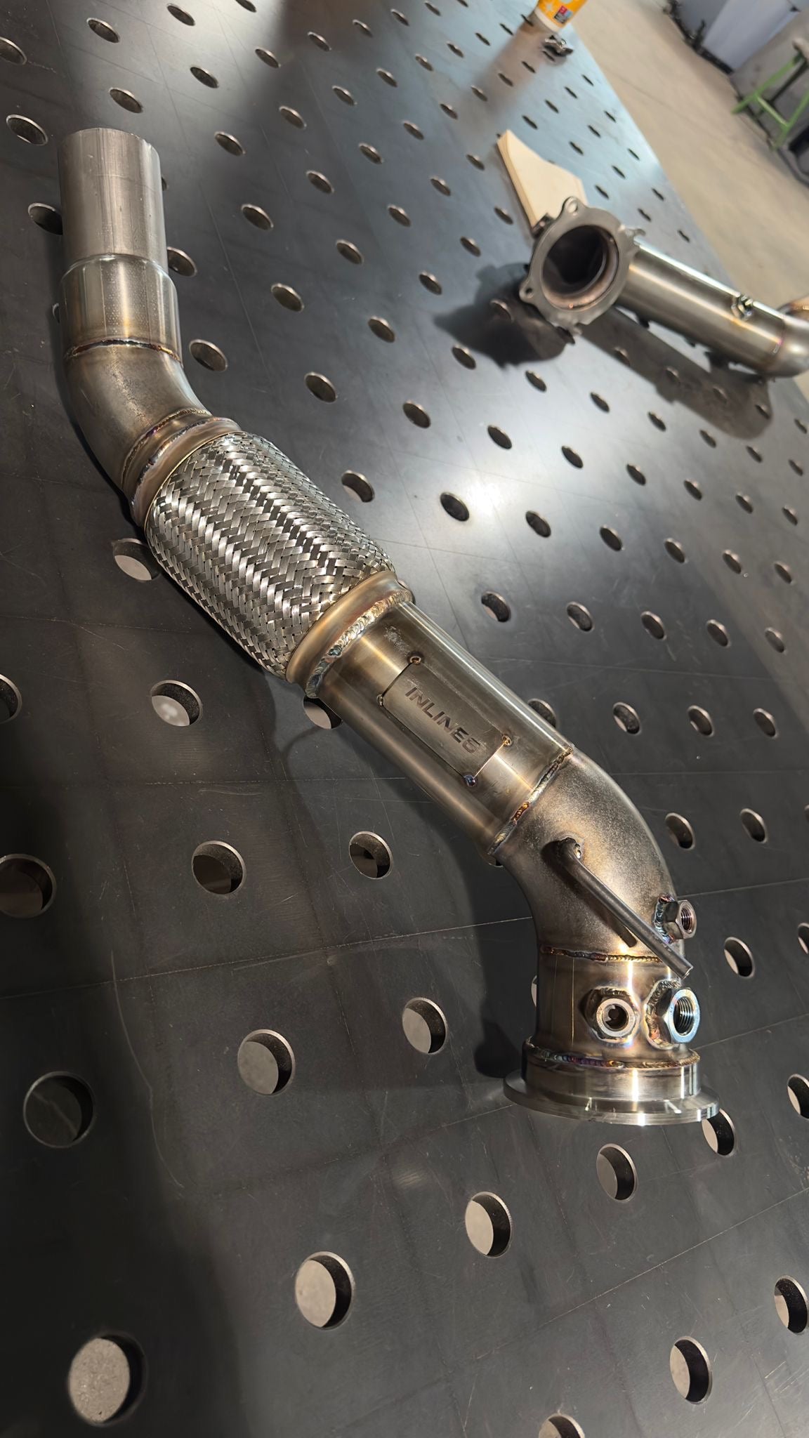 I6 - Hand-welded stainless steel downpipe M57